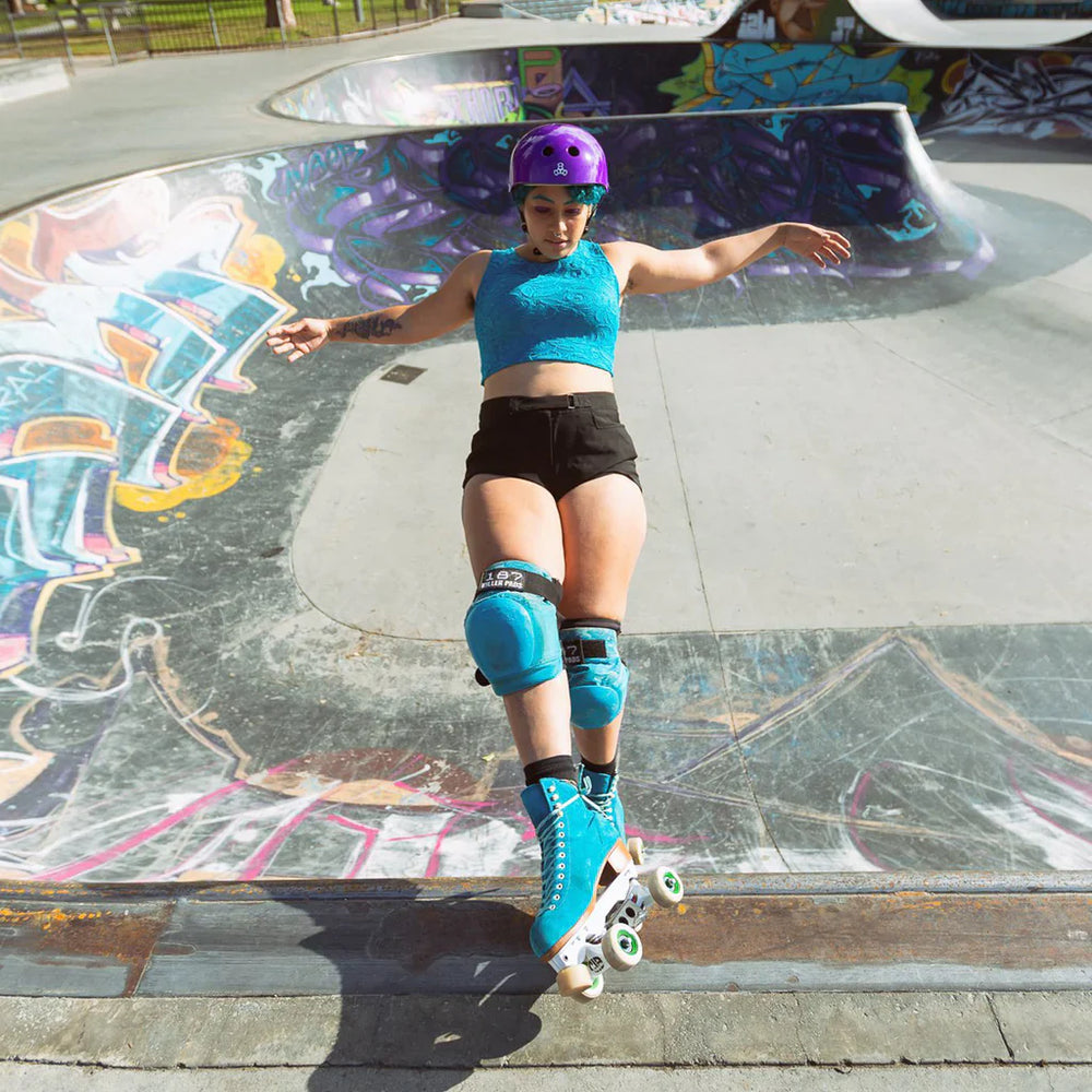 Roller skater wearing Triple 8 SS helmet Purple Gloss